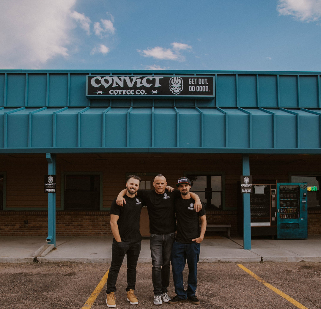Daniel Klehm, Dan Klehm, Damien Klehm standing in front of a building with 'Convict Coffee Co.' sign.