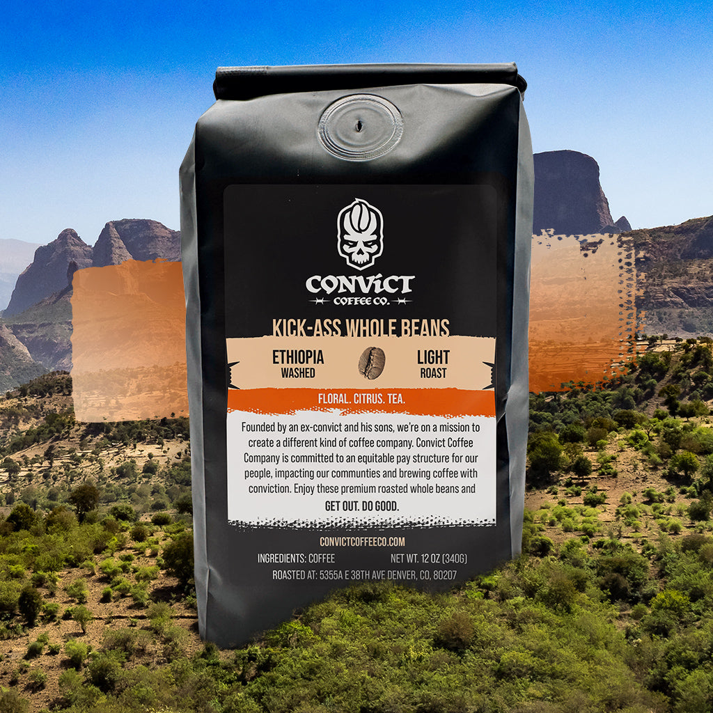 Bag of Convict Coffee Co. Ethiopia washed light roast coffee beans with a mountainous landscape in the background Ethiopia