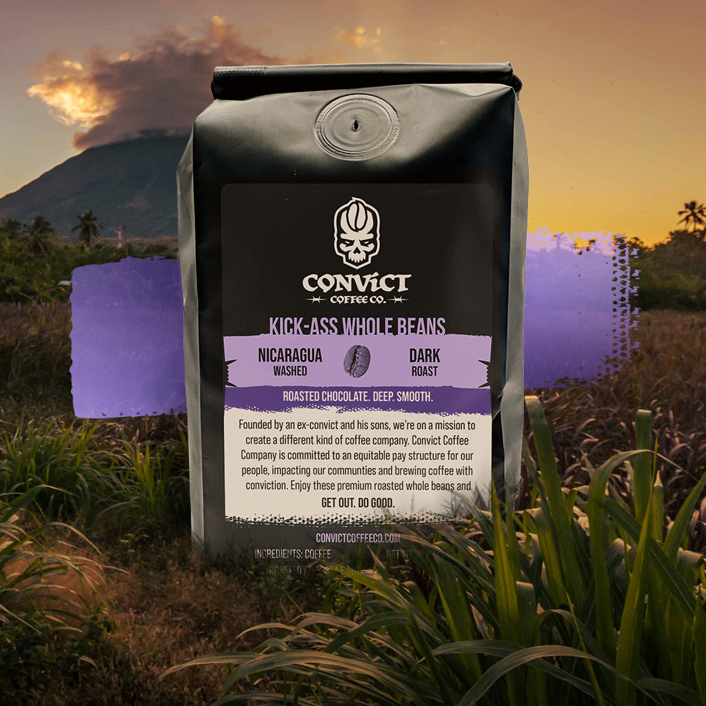 Coffee bag with Convict Coffee Co. branding Nicaragua Washed Dark Roast against a scenic Nicaragua background