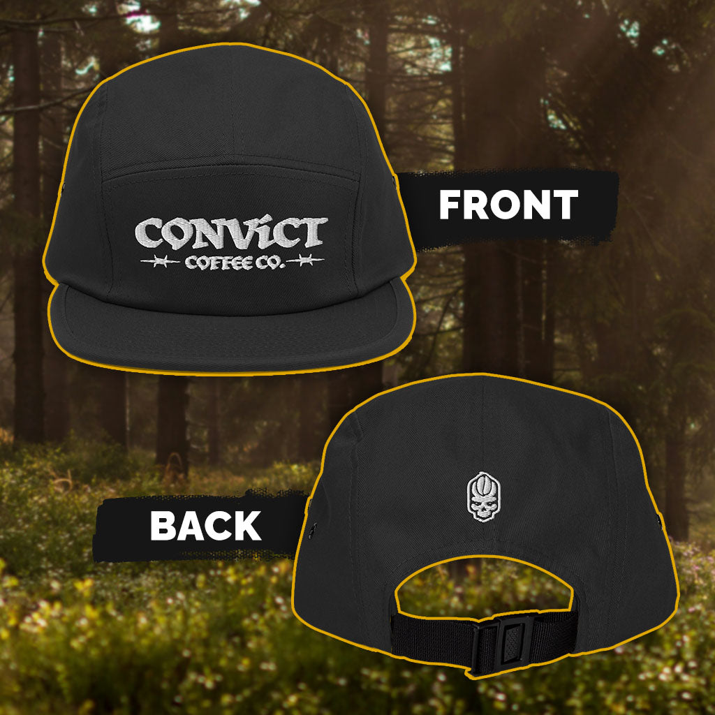 Black cap with visible Convict Coffee Co. branding on a natural background