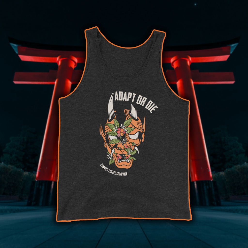 Charcoal Black Triblend tank top with a Japanese Oni and coffee plant design and 'Adapt or Die' text in front of red torii gates.