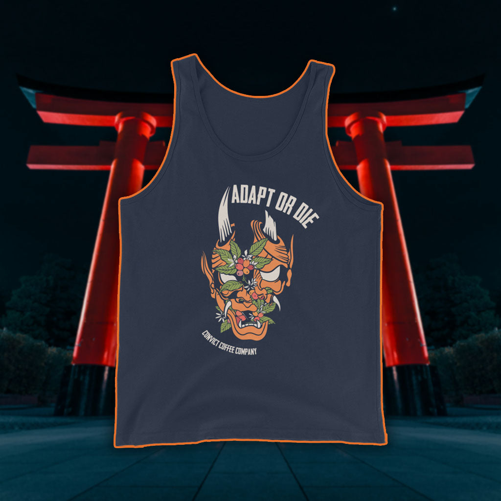 Navy tank top with a Japanese Oni and coffee plant design and 'Adapt or Die' text in front of red torii gates.