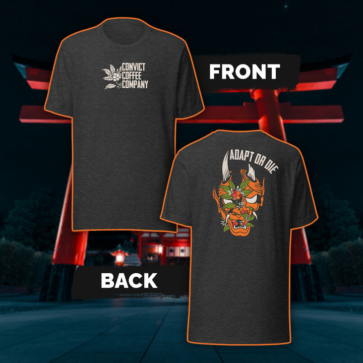 Dark Grey Heather tank top with a Japanese Oni and coffee plant design and 'Adapt or Die' text in front of red torii gates.