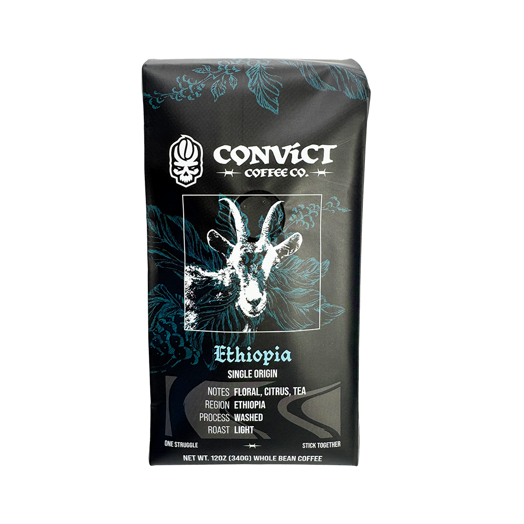 A bag of Convict Coffee Co. Ethiopia single-origin whole bean coffee, featuring a black package with teal floral patterns and a white goat illustration.