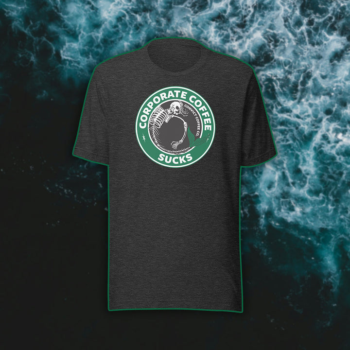 Dark Grey Heather t-shirt with a green, black, and white 'Corporate Coffee Sucks' design with dead mermaid print on a dark water background