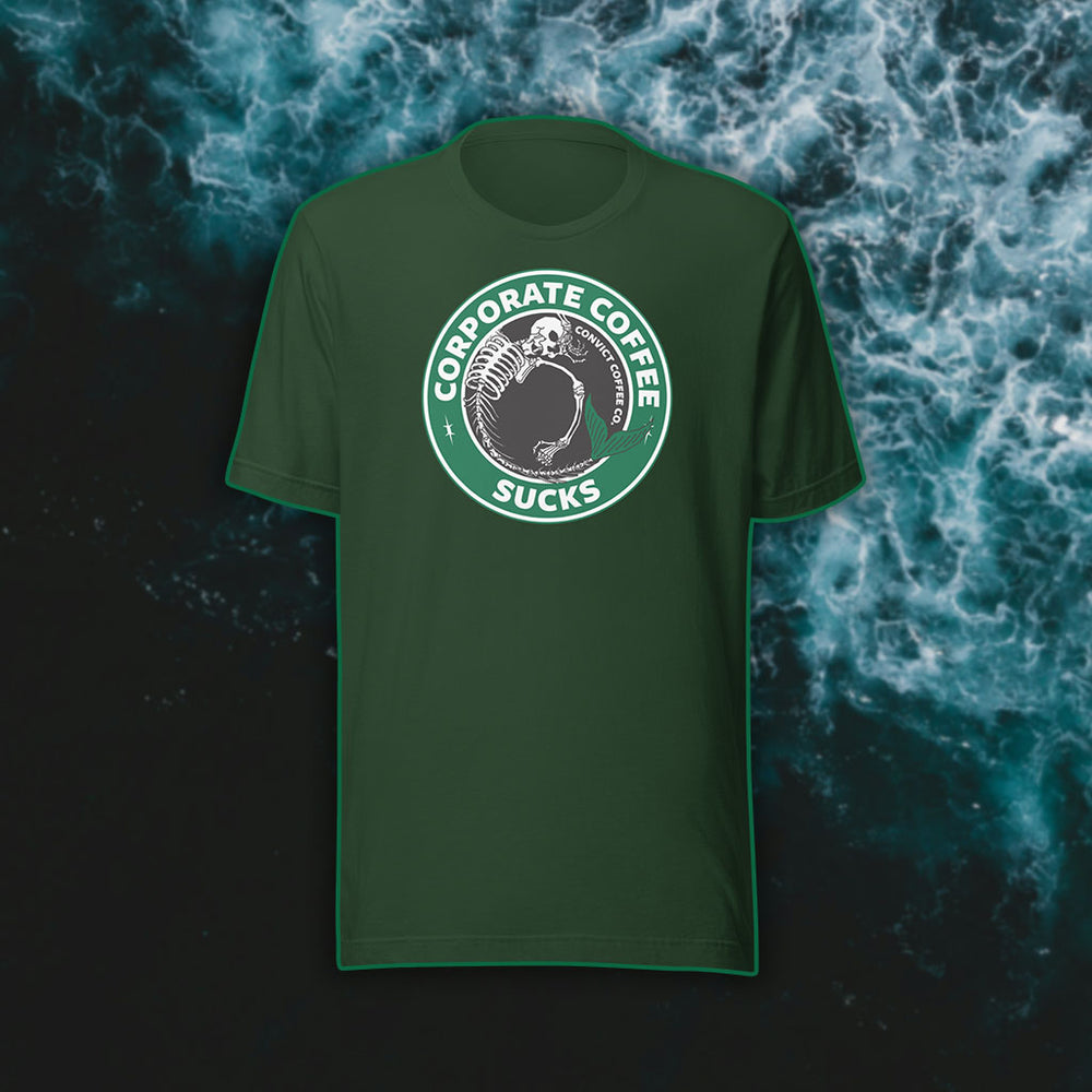 Forest t-shirt with a green, black, and white 'Corporate Coffee Sucks' design with dead mermaid print on a dark water background