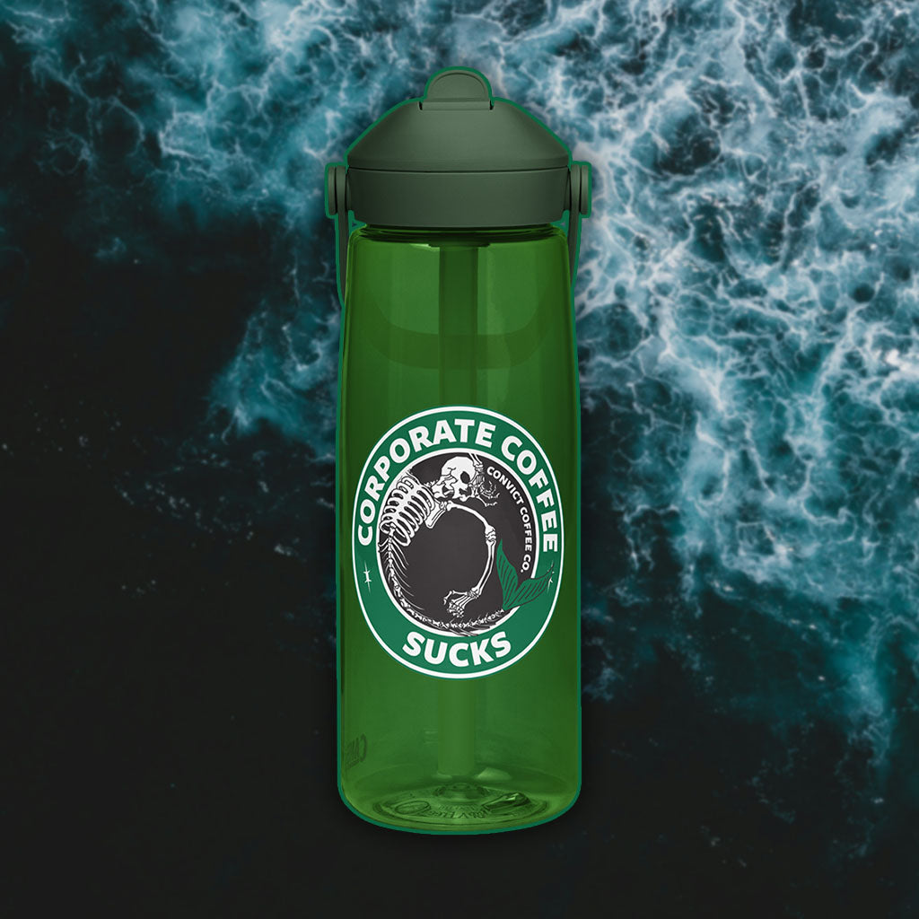 Green water bottle with a Corporate Coffee Sucks Design on a dark, water background