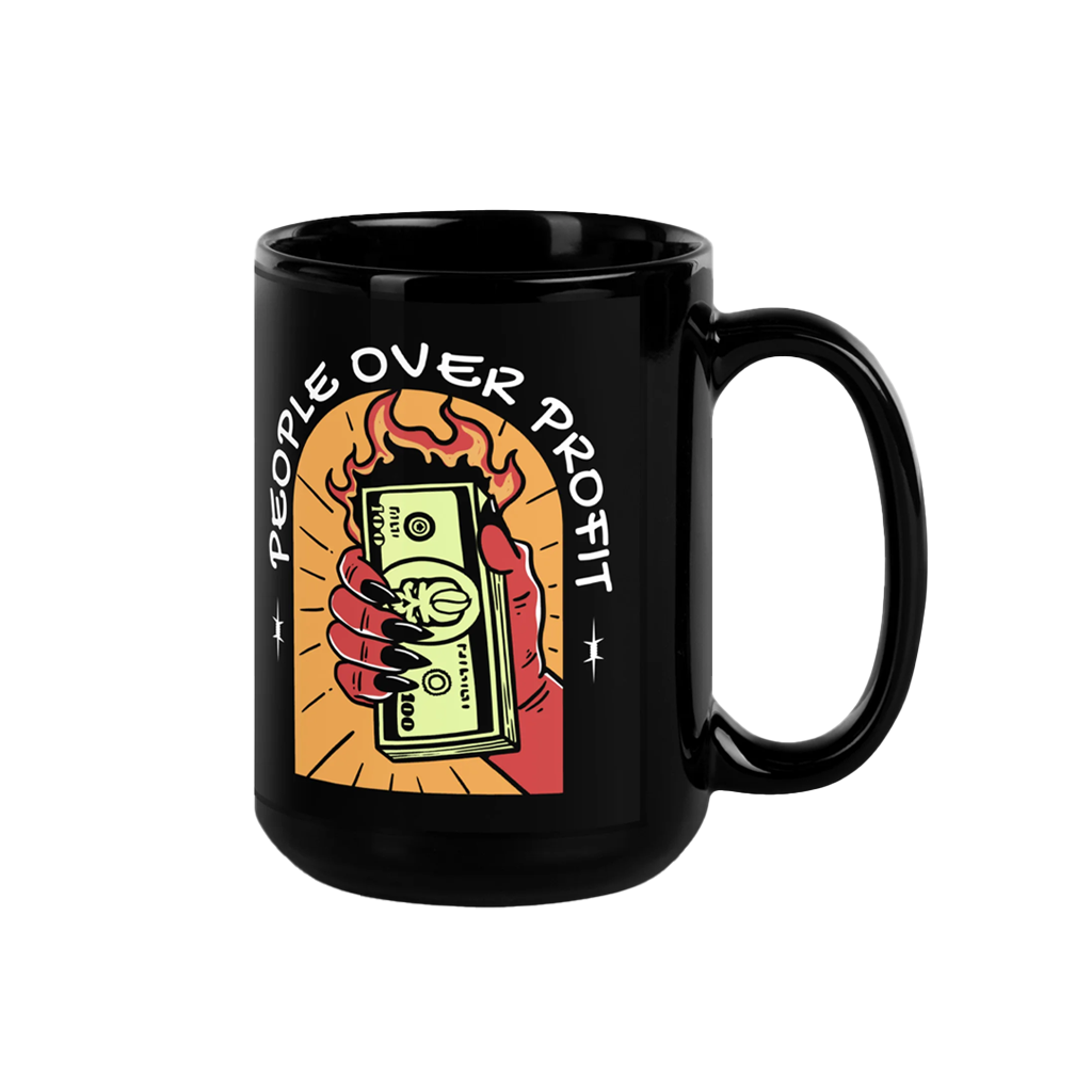 Black mug with a graphic design of a hand holding money and 'People Over Profit' text in front of white coffee fingerprint branding on transparent background