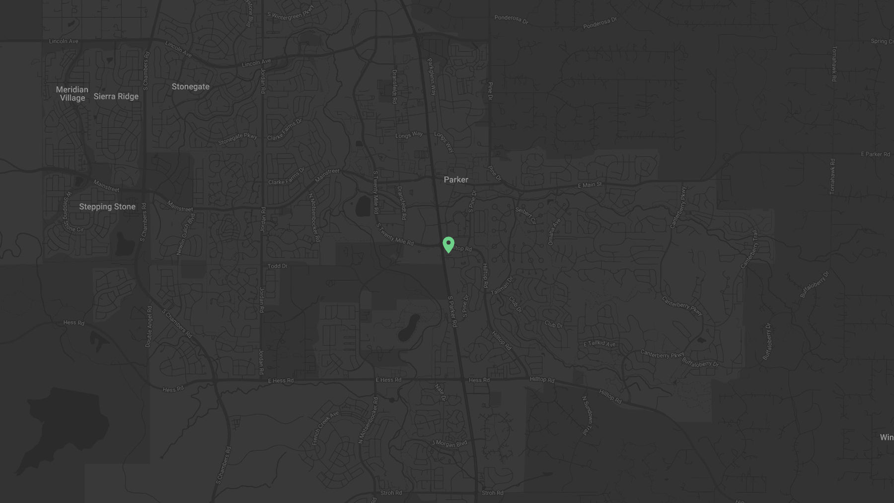 Dark Map with a green pin indicating a location in Parker Colorado on Hilltop and Parker Rd