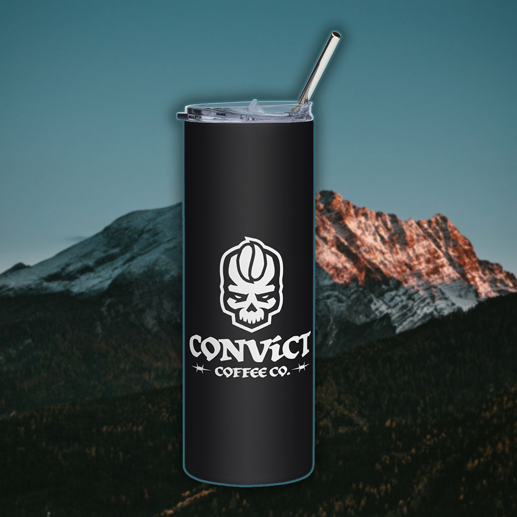 Black tumbler with Convict Coffee Co Stacked logo against a mountainous background